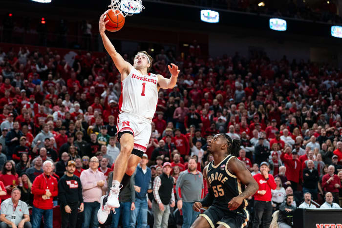 Nebraska guard Sam Hoiberg shoots the ball against Purdue guard Lance Jones during the first half Tuesday night at Pinnacle Bank Arena in Lincoln. (Jan 9, 2024)